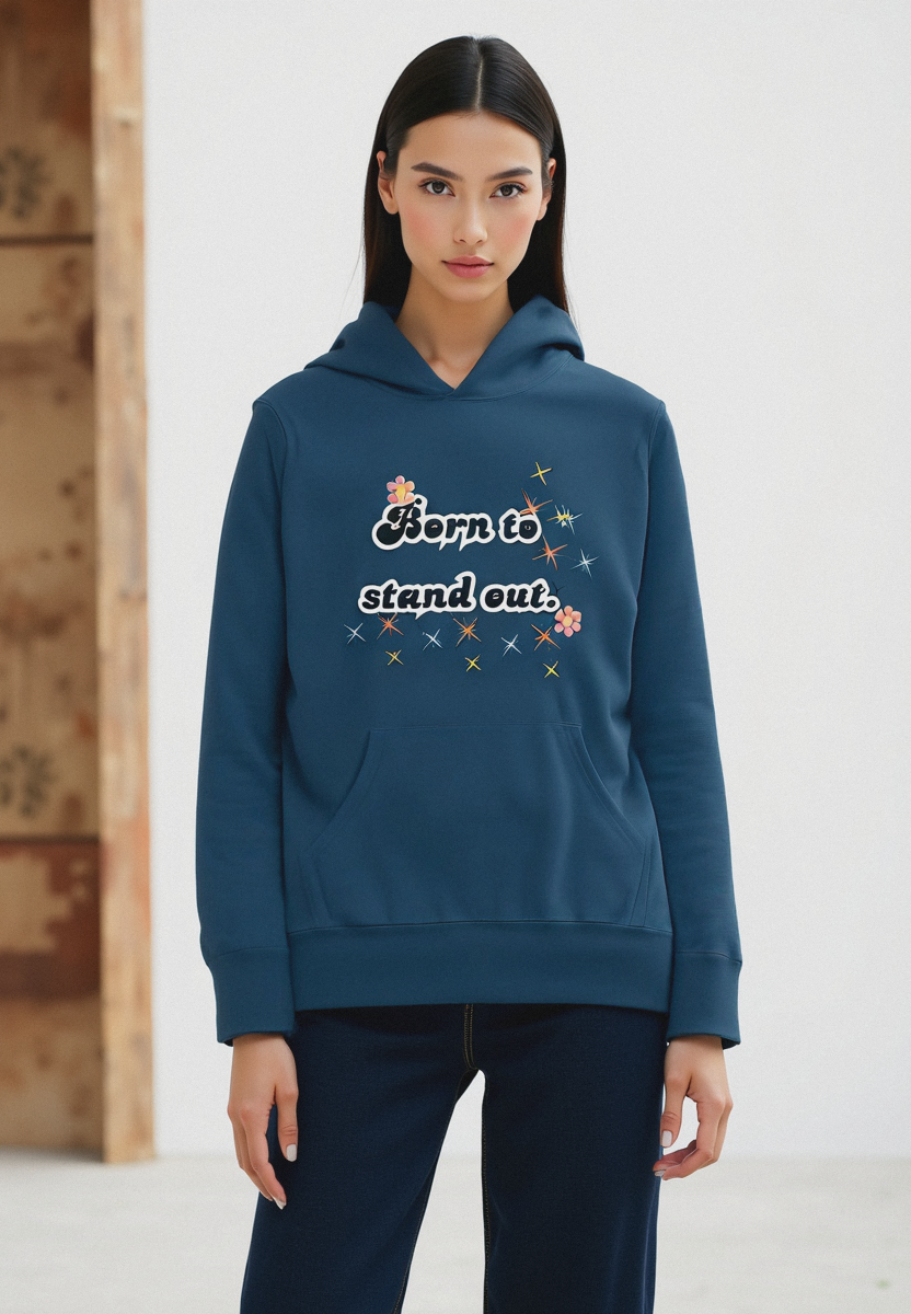 A person wearing a blue hoodie with text and graphics on the front.
