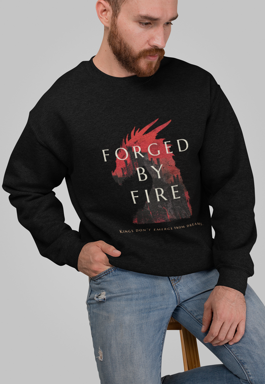 A man wearing a black sweatshirt with 'FORGED BY FIRE' text and a graphic on the front.