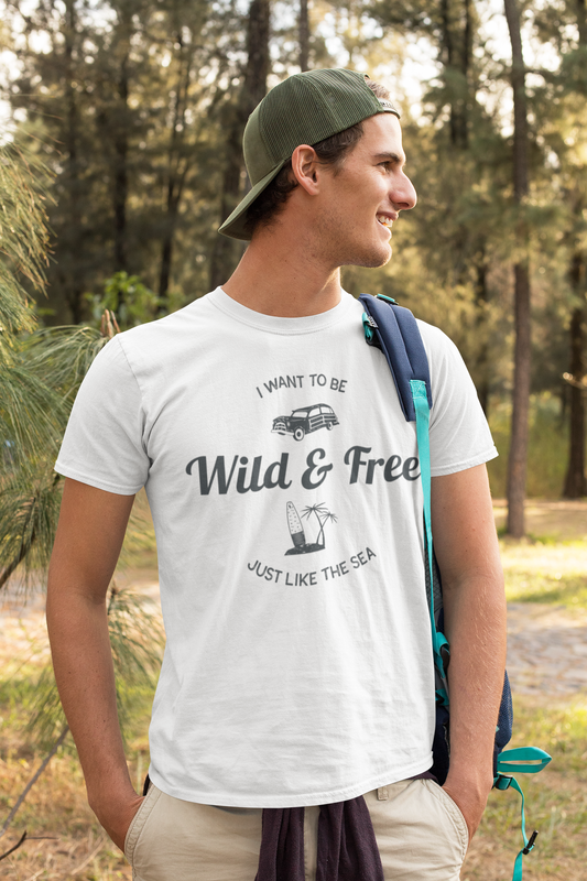 Man wearing a t-shirt with 'Wild & Free' text in a forest setting