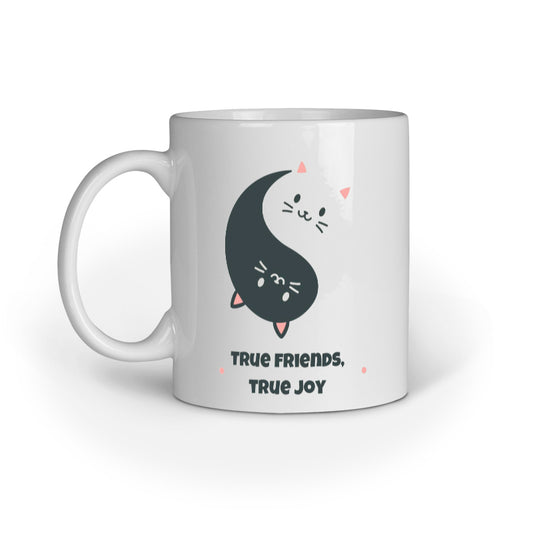 White mug with a yin yang design of a cat and text 'True Friends, True Joy' on a white background